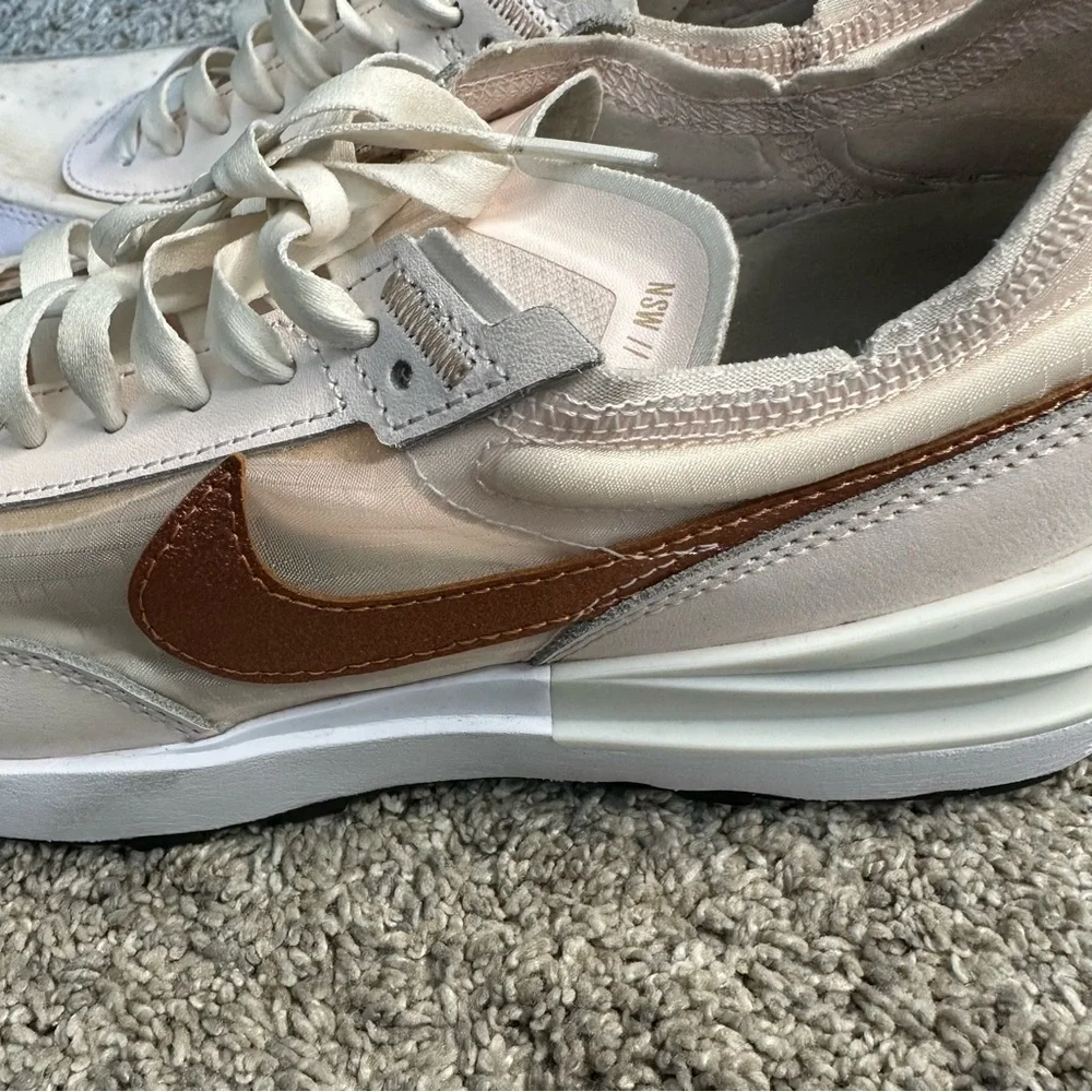 Nike Women's Sneakers in White with Metallic Rose Gold Swoosh